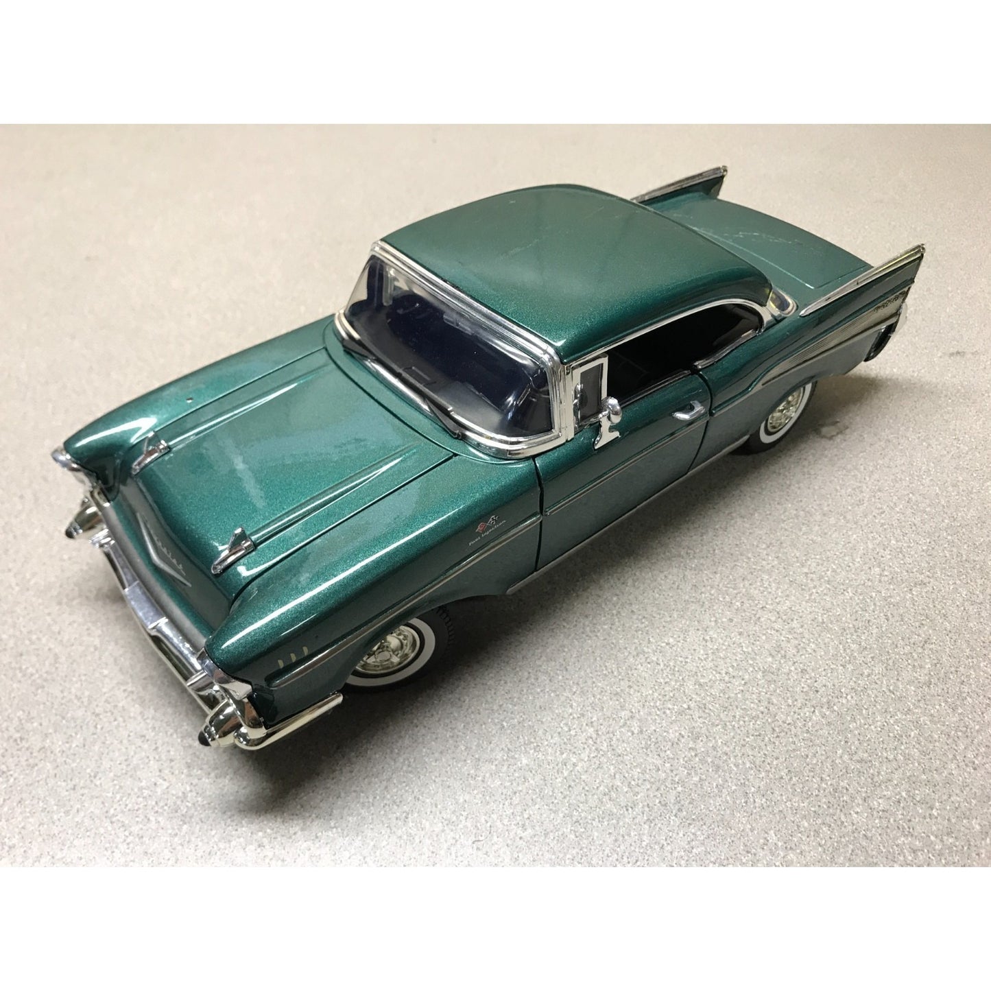 1957 Chevy Bel Air Hardtop Green Die Cast 1:18 Scale - Motor Max No. 73175 top view of front end and drivers side
