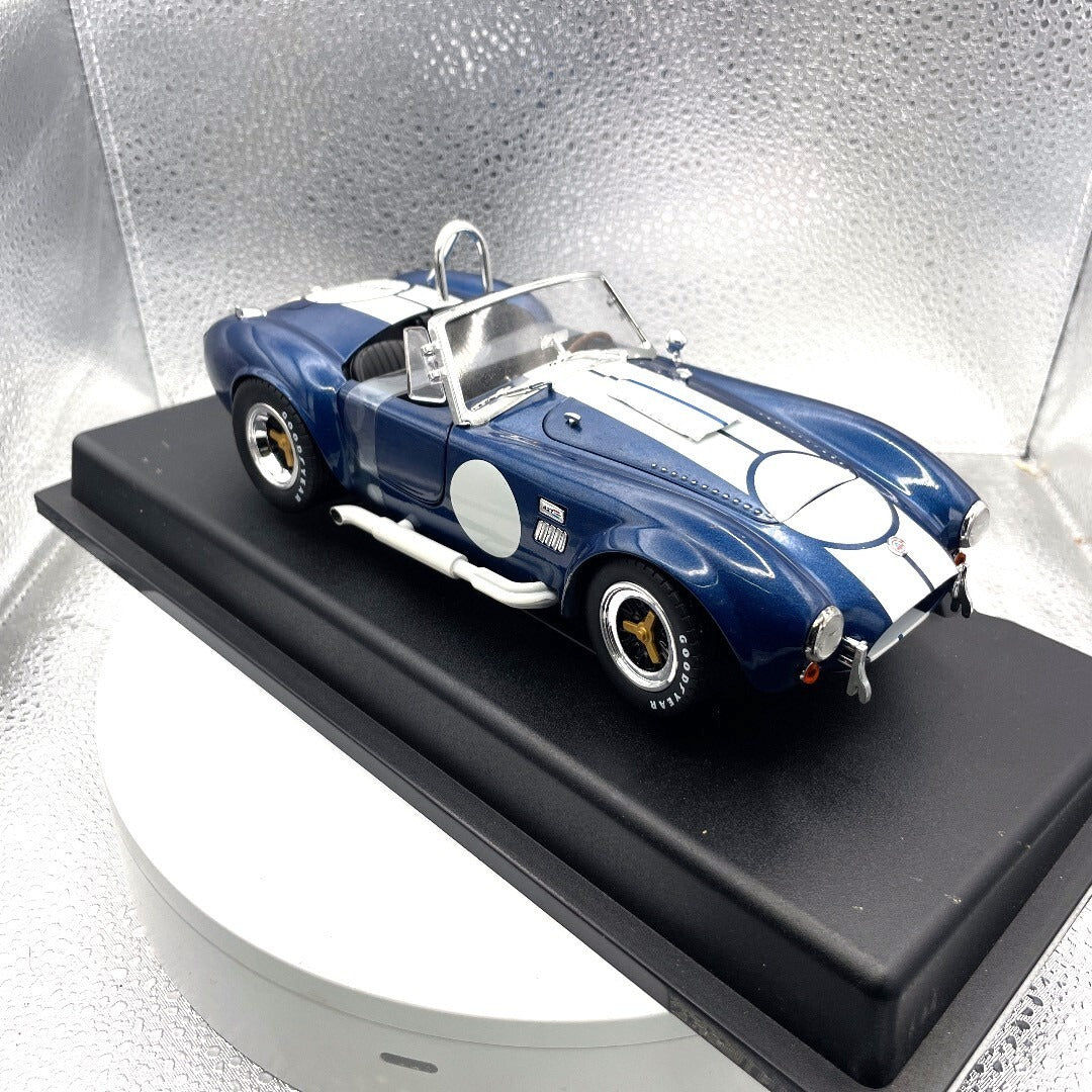 1965 Shelby Cobra 427 S/C Blue Die Cast Carroll Shelby Sig, Scale: 1/18 passenger/front side view