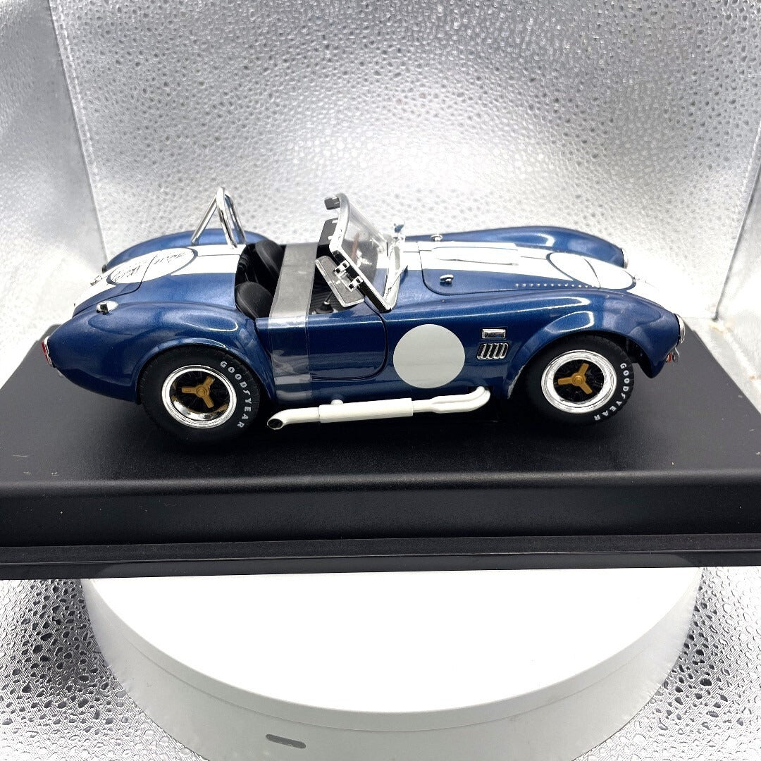 1965 Shelby Cobra 427 S/C Blue Die Cast Carroll Shelby Sig, Scale: 1/18 passenger side view