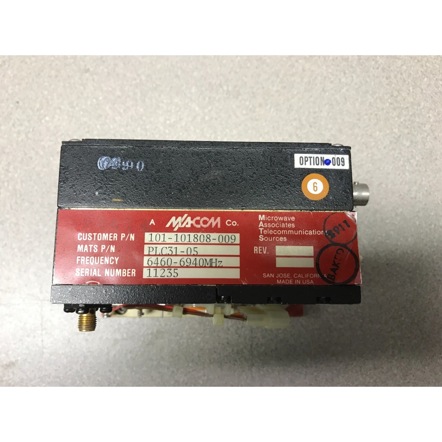 M/A-COM PLC31-05 Phase Lock Source 6460-6940 MHz top view with product label
