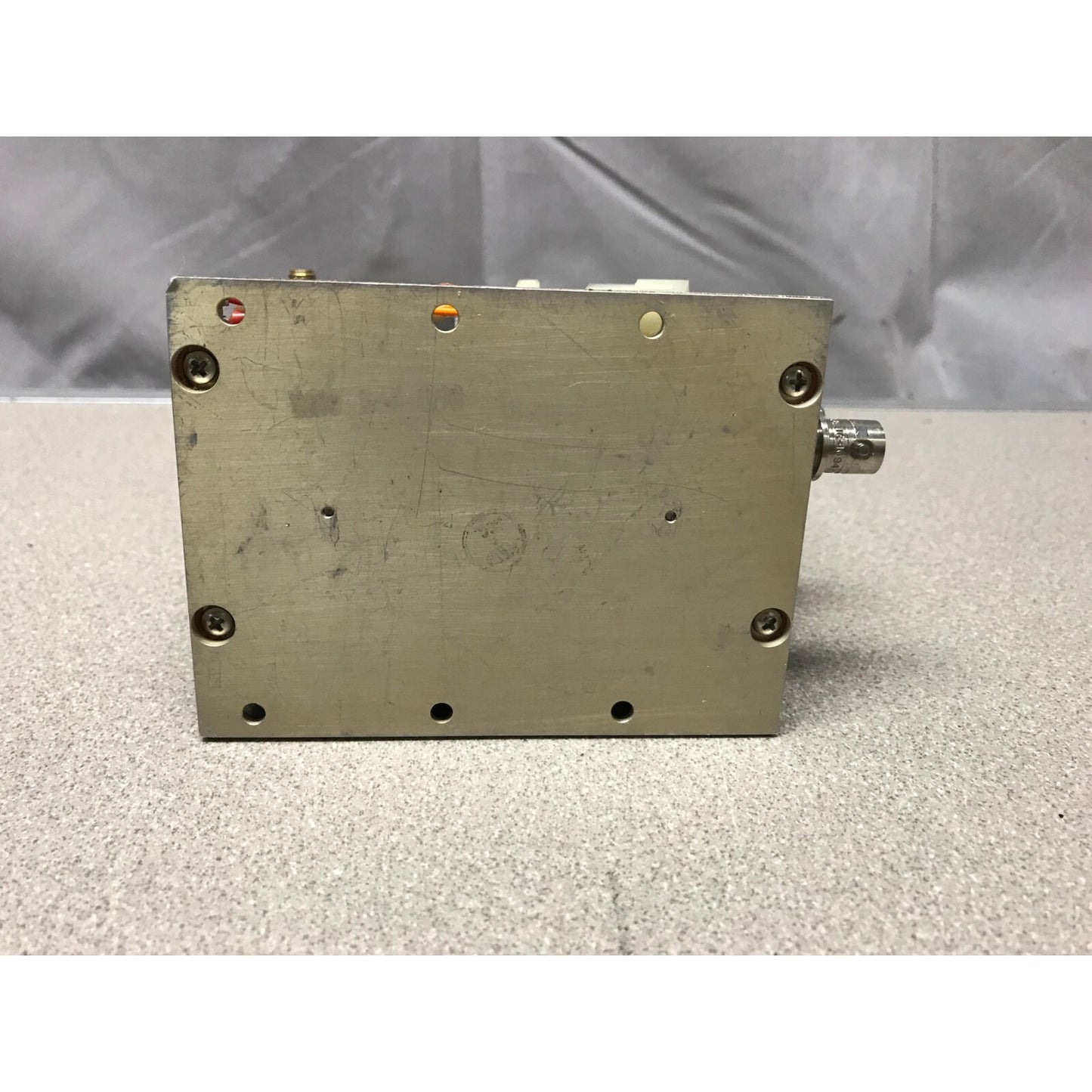 M/A-COM PLC31-05 Phase Lock Source 6460-6940 MHz bottom view with holes for mounting