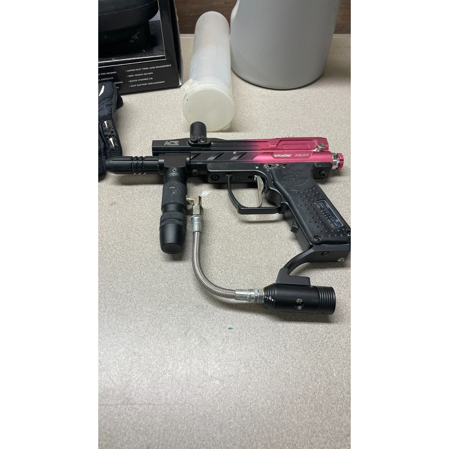 Spyder Pilot ACS Paintball Gun Black/Pink Lot, No Barrel, Accessories Included closeup of paintball gun