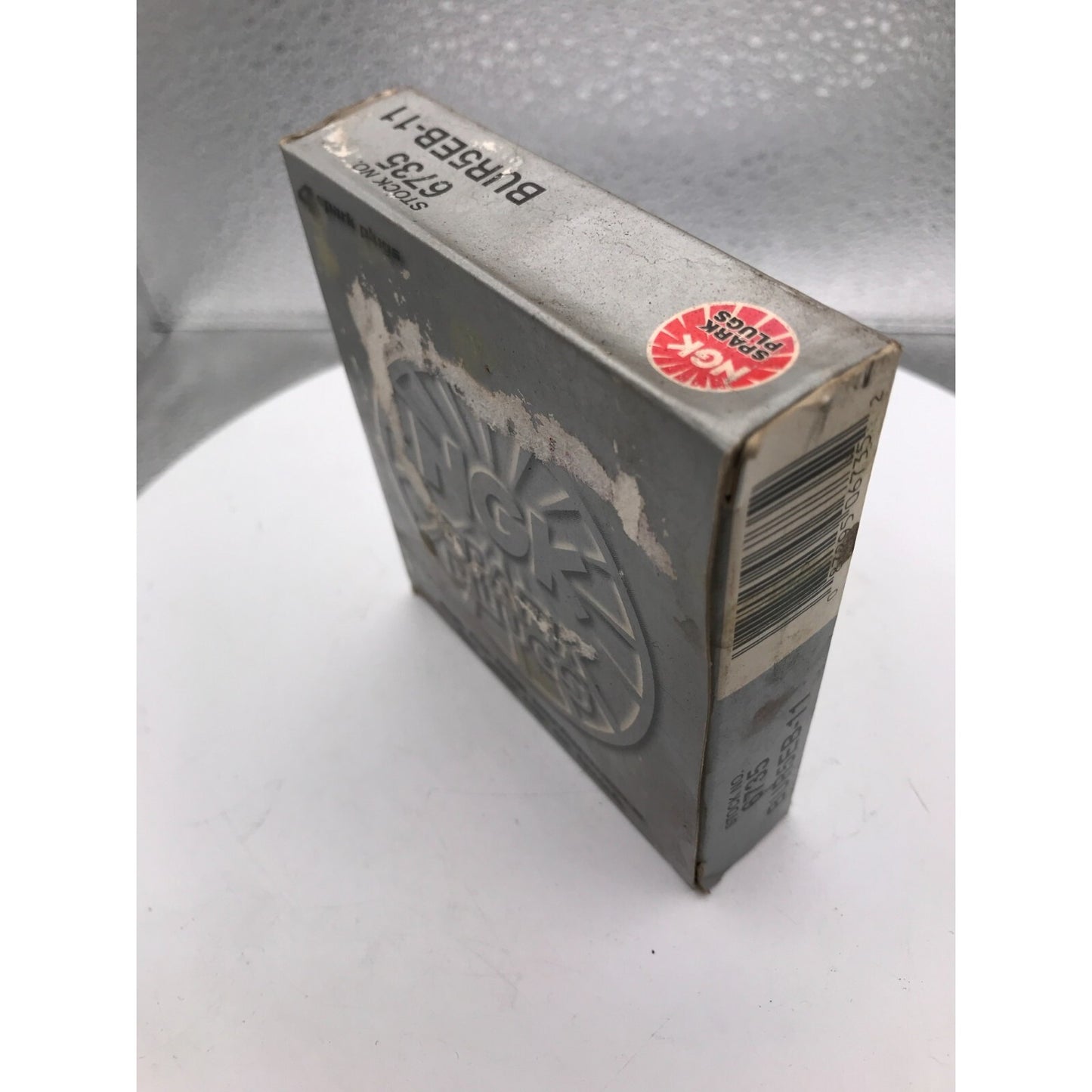 NGK Spark Plugs BUR5EB-11 Stock No. 6735 - Lot of 4 silver box front, top side of box
