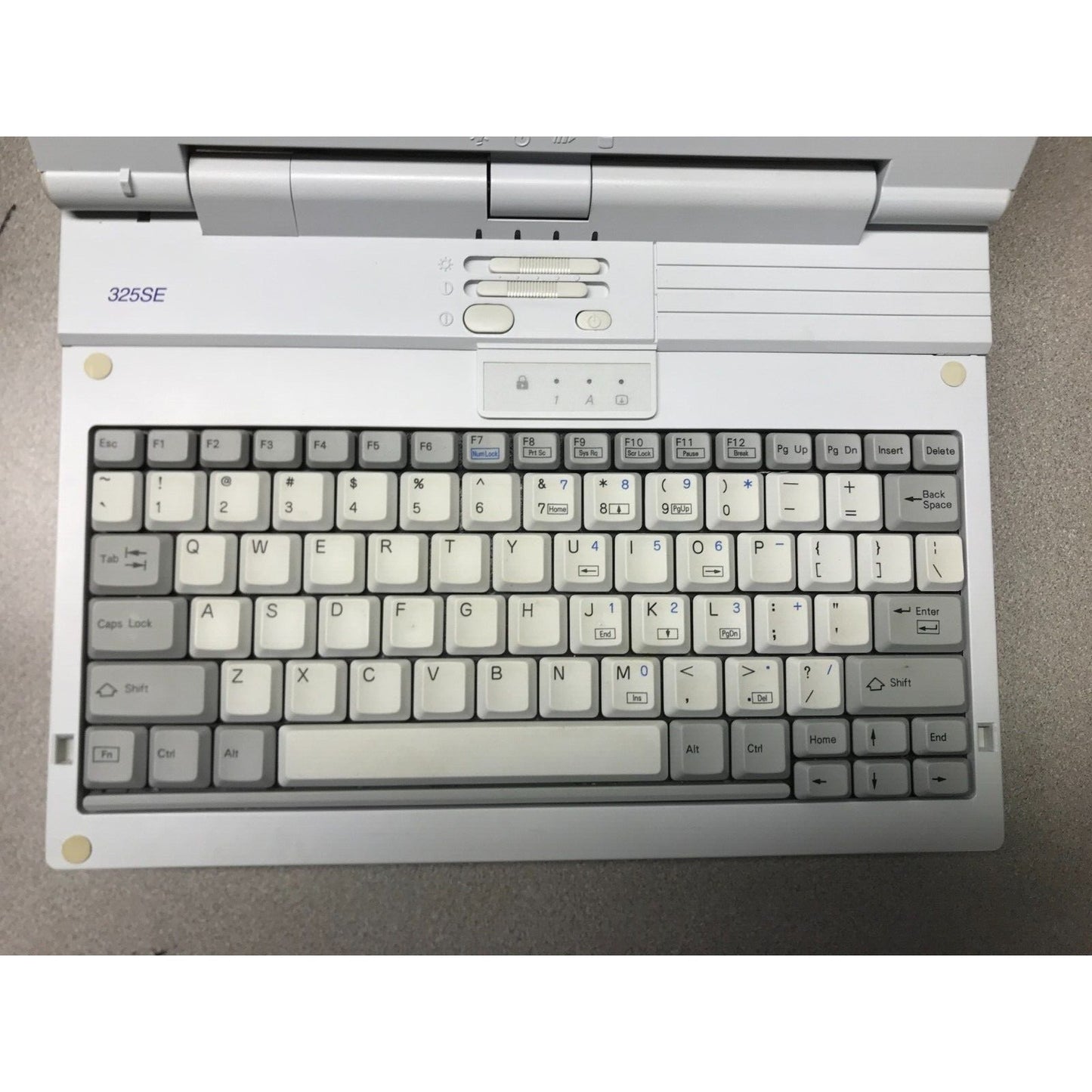 Acros 325SE Computer - Includes various cables and Leather Carrying Bag laptop opened