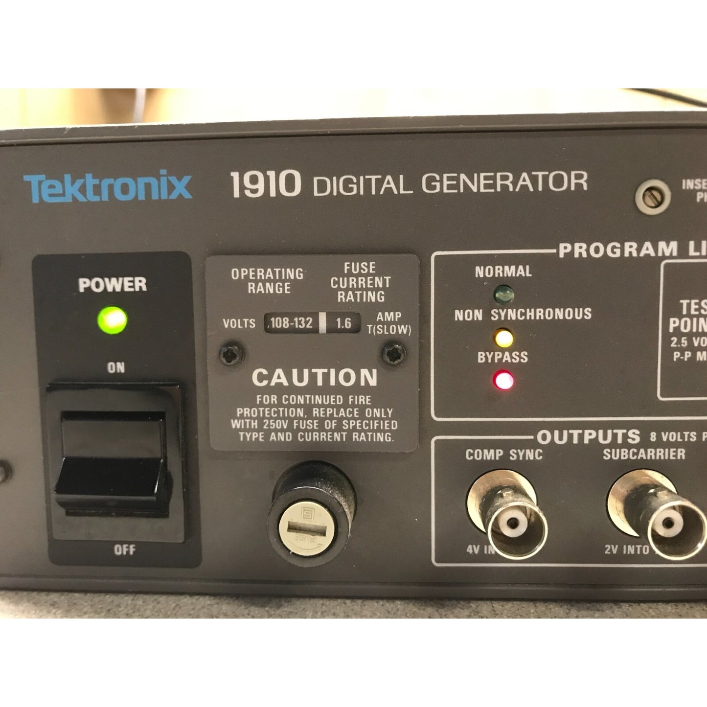 Tektronix 1910 Digital Generator panel close up power ,connectors, status lights