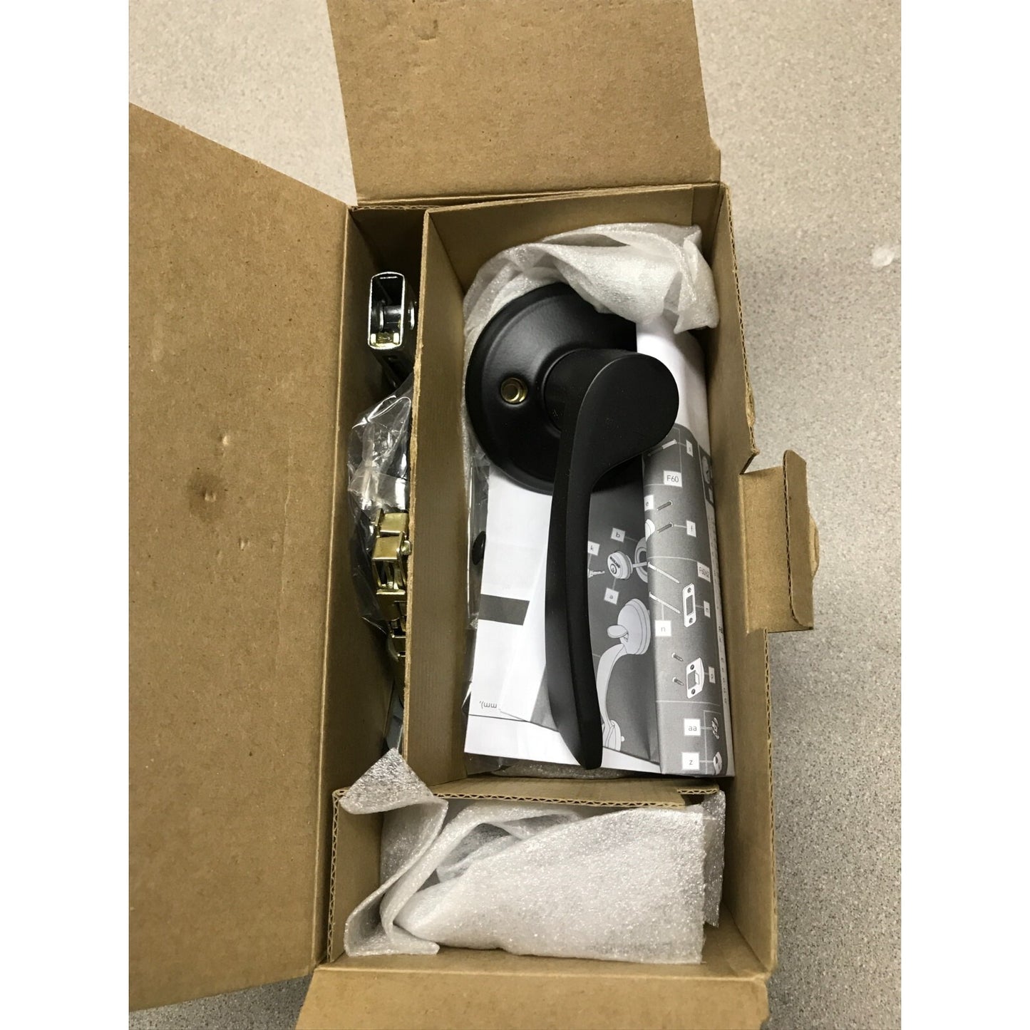 Schlage Inside Handle Set Black, F59 MER622 RH top view in box