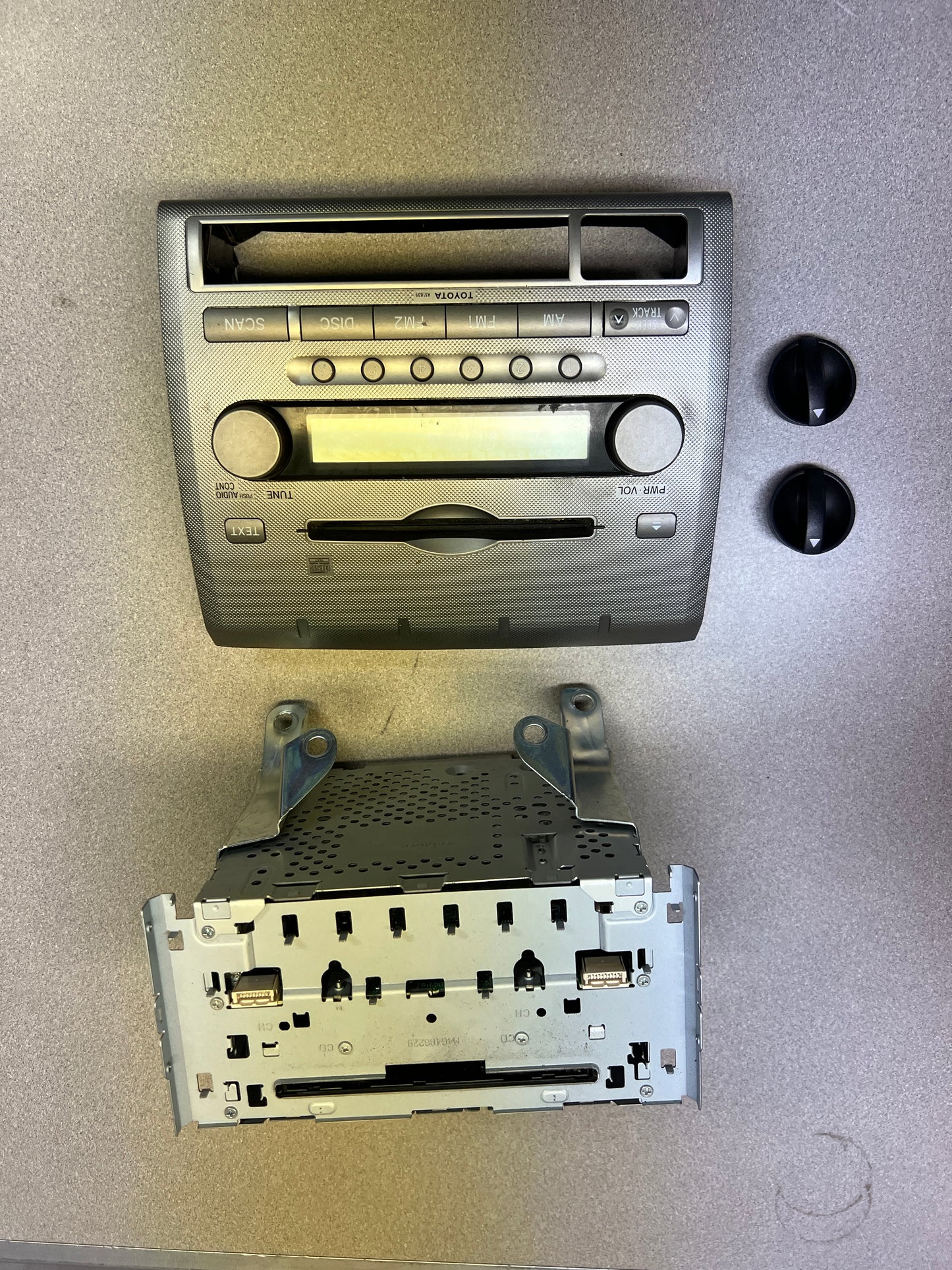 Stock Toyota Tacoma Radio (2005-2008) Model #: 86120-04141 faceplate, knobs