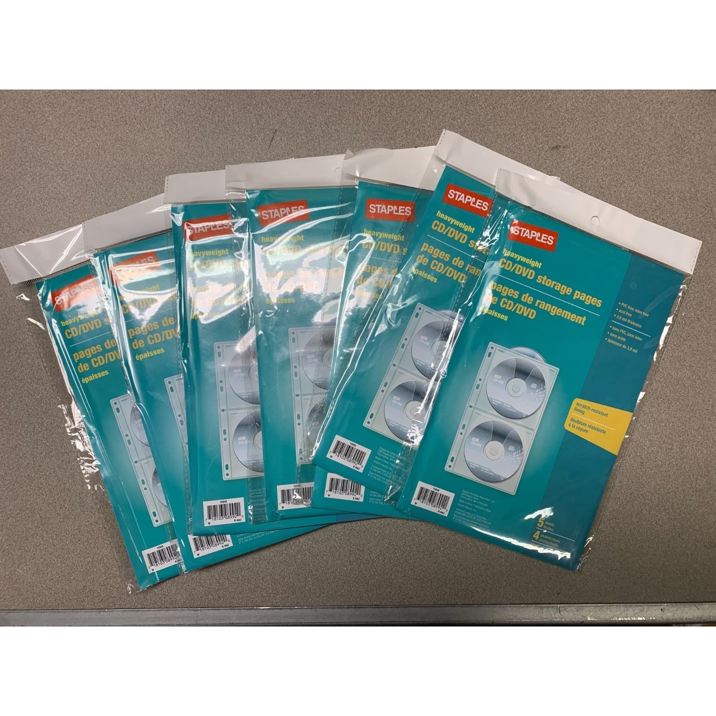CD/DVD storage pages heavyweight with scratch resistant fabric lining set of 7 packages spread out