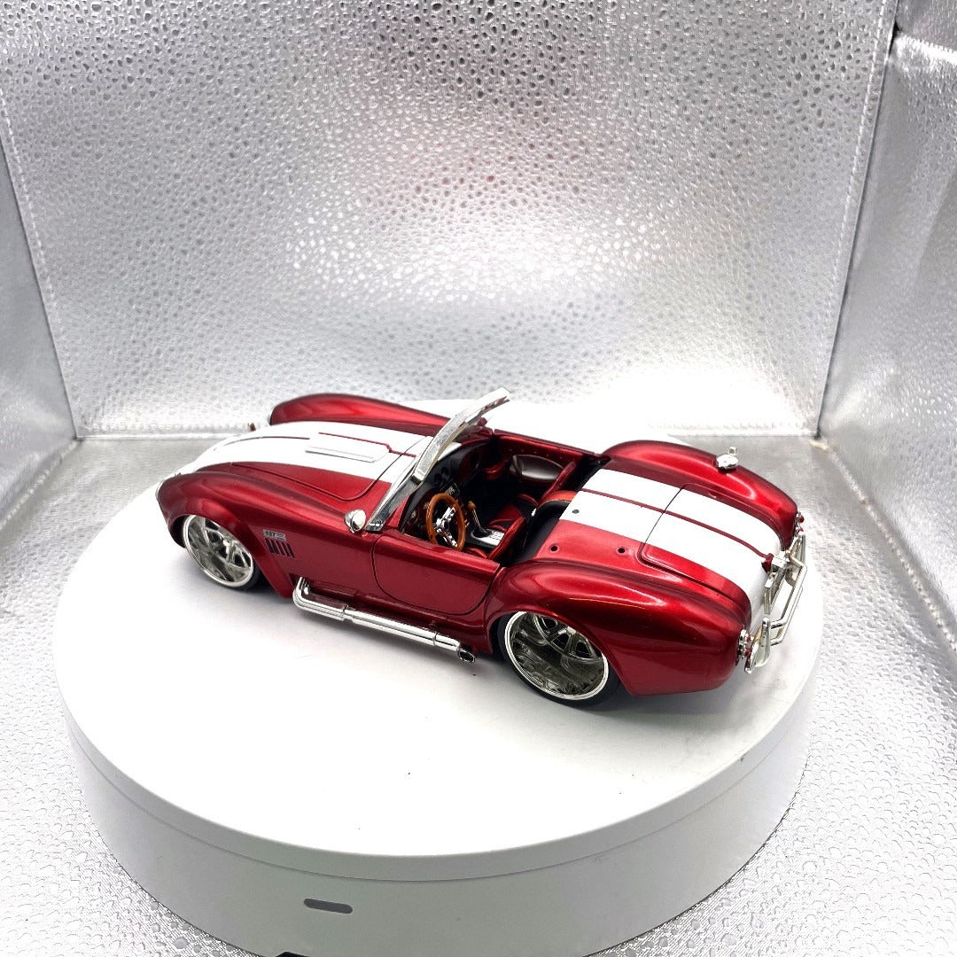 Jada Toys 1965 Shelby Cobra 427 S/C Red Die Cast, Scale: 1/24, No. 90540 drivers side/back end view
