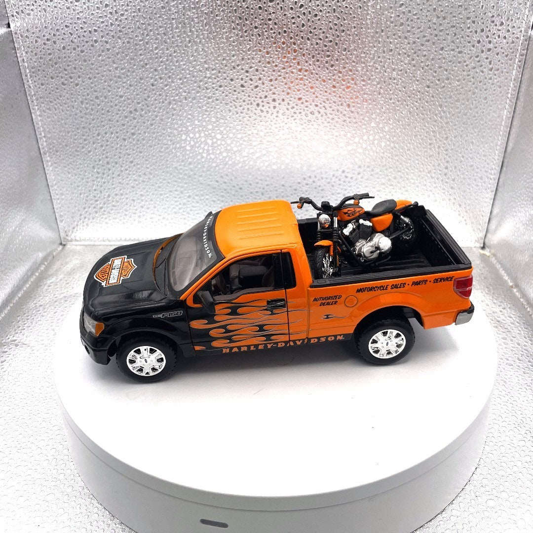 Maisto 2010 Ford F-150 STX Harley Davidson Die Cast with Motorcycle, Scale: 1/27, No. 01618 drivers side view with motorcycle in bed