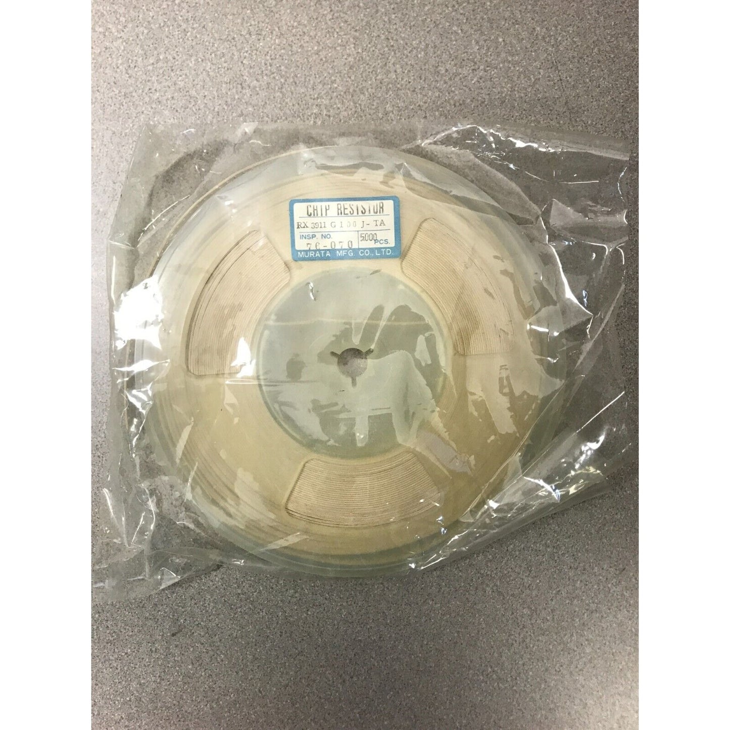 Murata SMD Chip Resistor Stripe RX 3911 G100J-TA top view in packaging