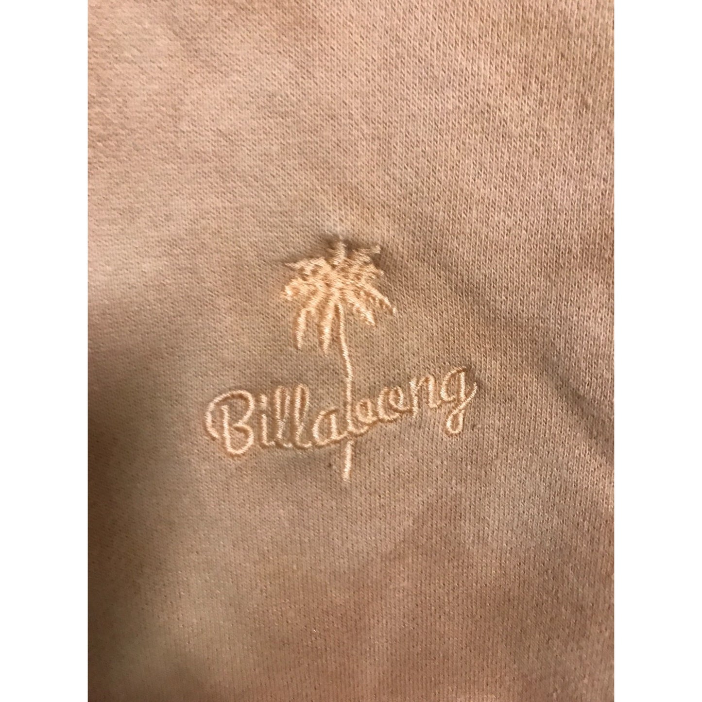 Billabong Hoodie Women's Medium Orange Tie Dye closeup of embroidered Billabong logo on front of hoodie