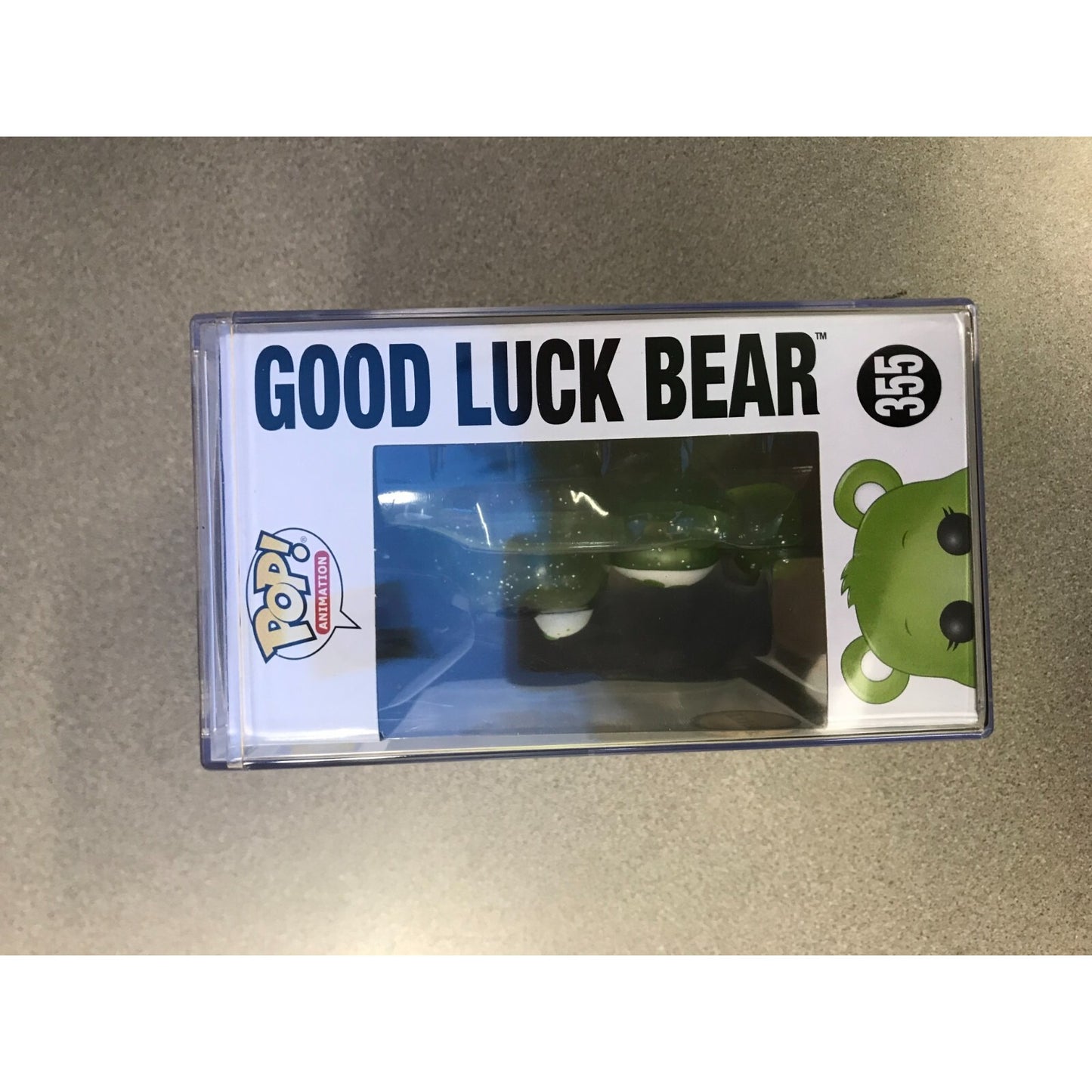 Funko Pop! Care Bears 355 Good Luck Bear with Case Chase front of package with bear displayed