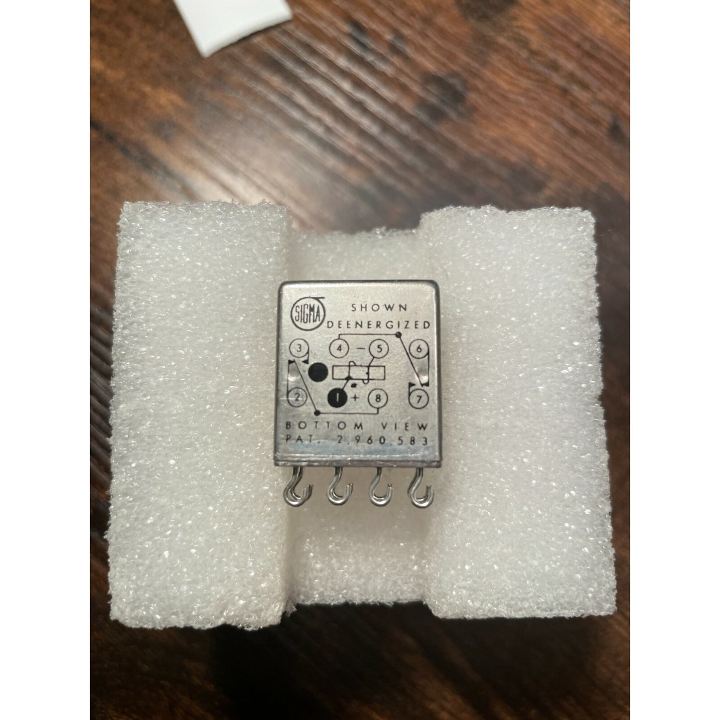 SIGMA Instruments Mil Spec Metal Relay, 33RJK 4900FG SIL, 4900 OHMS, 26VDC, 2Amp top view in packaging