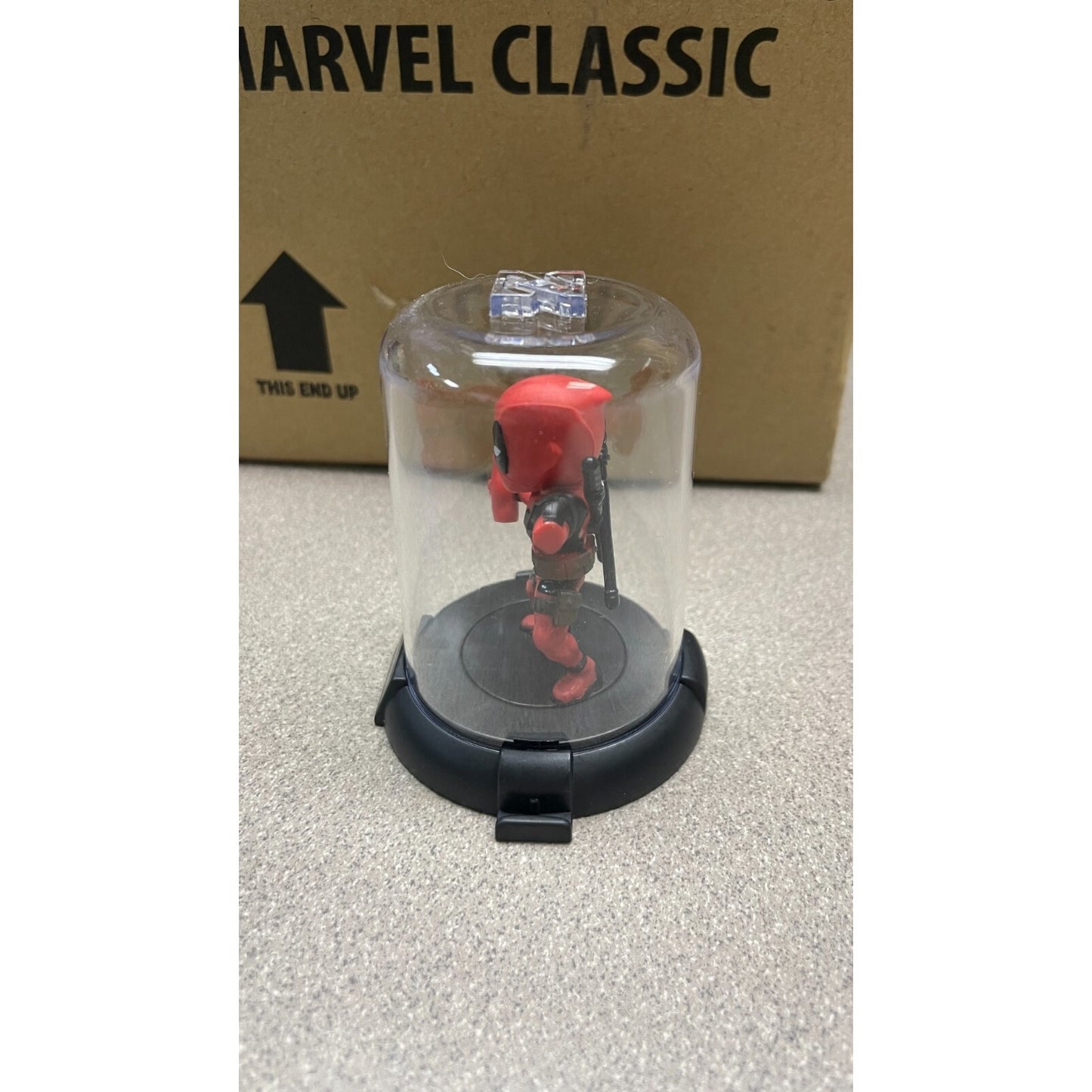 Domez Deadpool Collectible 2 of 8 (Missing Arm Pose) side view