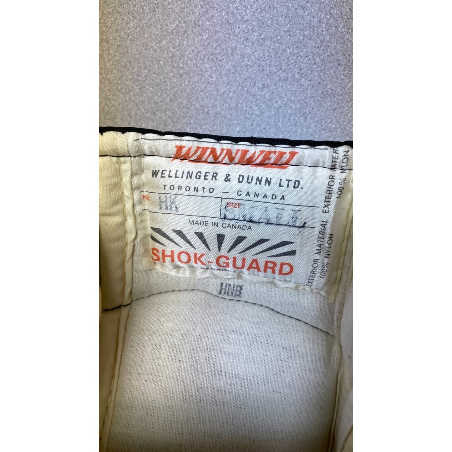 Winnwell HK Shok-Guard Hockey Pants with Guards - Size S inside label closeup