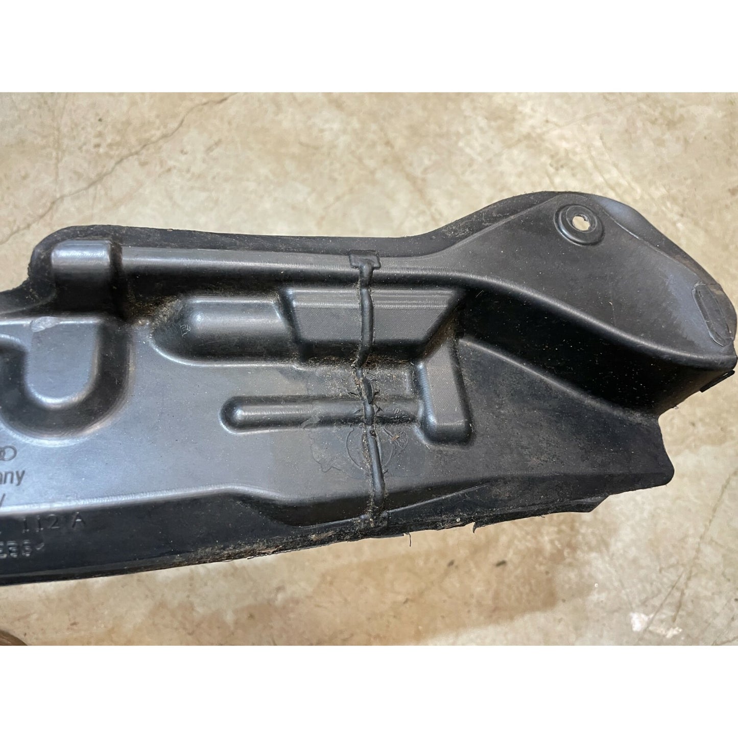 Right Inner Fender Shield Plate - AUDI A4 RS4 S4 - 8E0821112A top view of end closeup