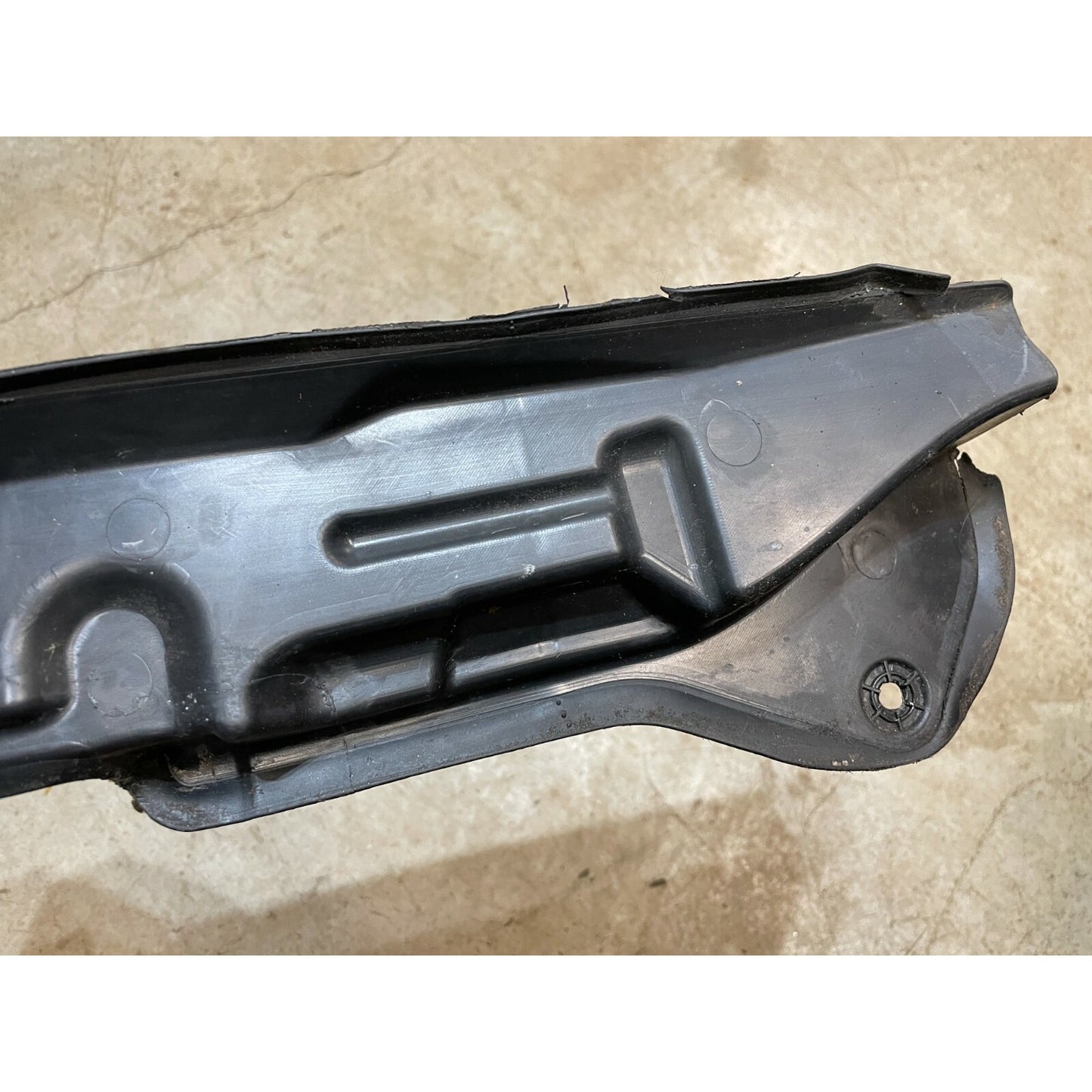 Right Inner Fender Shield Plate - AUDI A4 RS4 S4 - 8E0821112A top view of end closeup