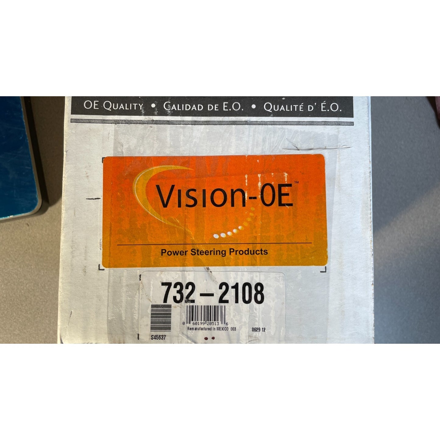 Vision-0E power steering product packaging with label and barcode