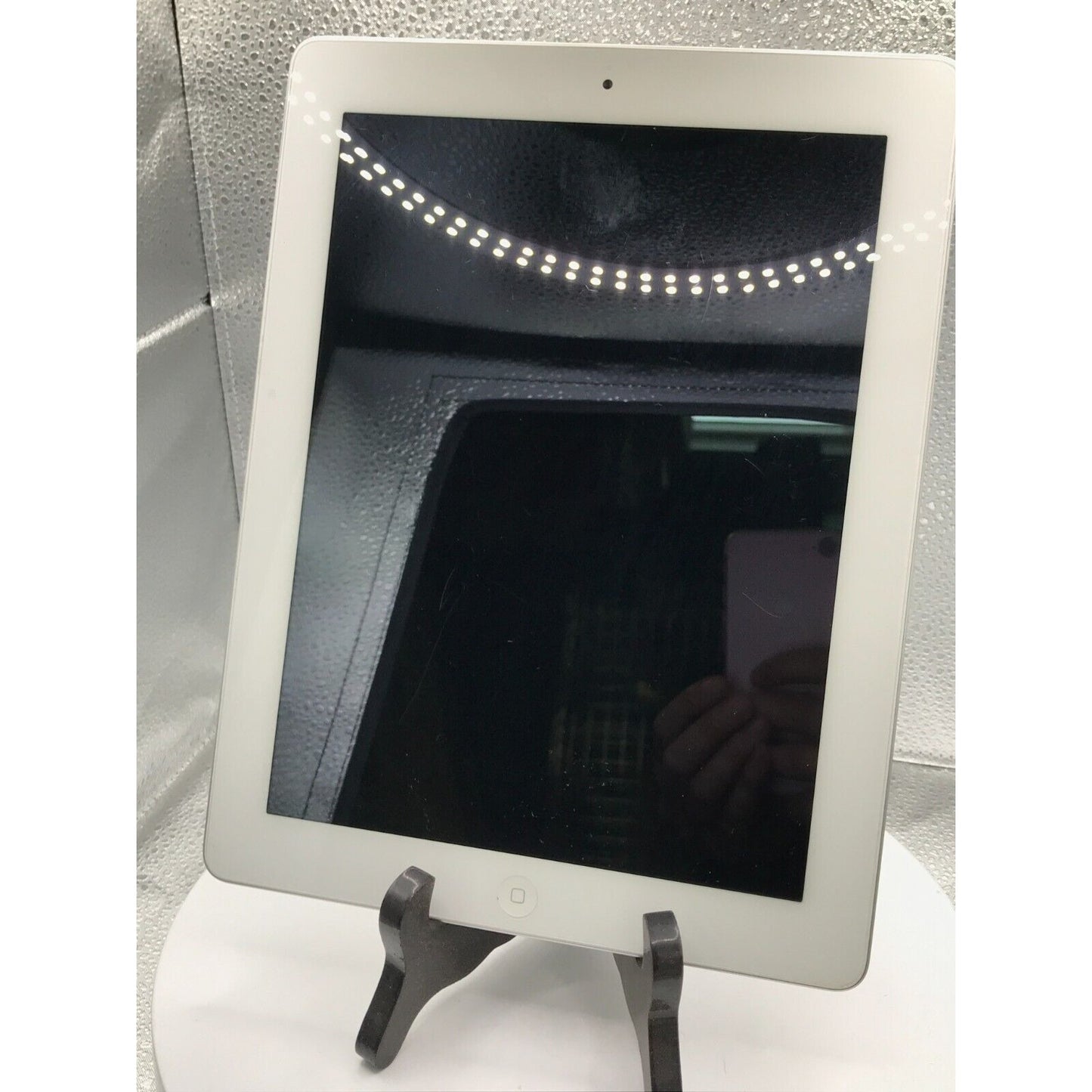 Used iPad 2 Model A1395 16GB with charging cable front view