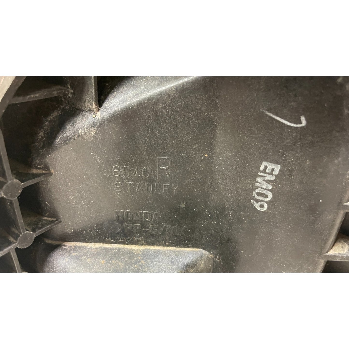 OEM Honda Civic Del Sol Right Headlight Headlamp 6646 Stanley closeup of product stamp