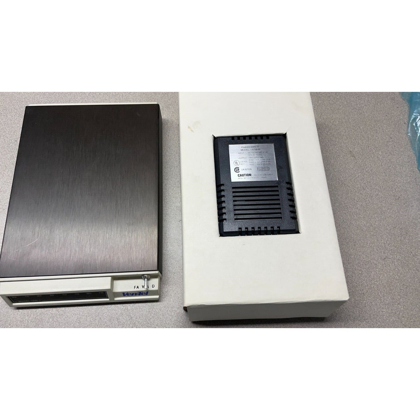 Ven-Tel Modem and Power Cord Model 1200-1 top of unit and box