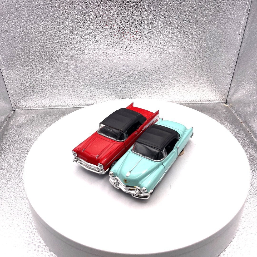 Welly Wind Up Car Lot of 2, 1857 Chevrolet Bel Air Red, 1953 Cadillac Eldorado Teal front/driver's side view