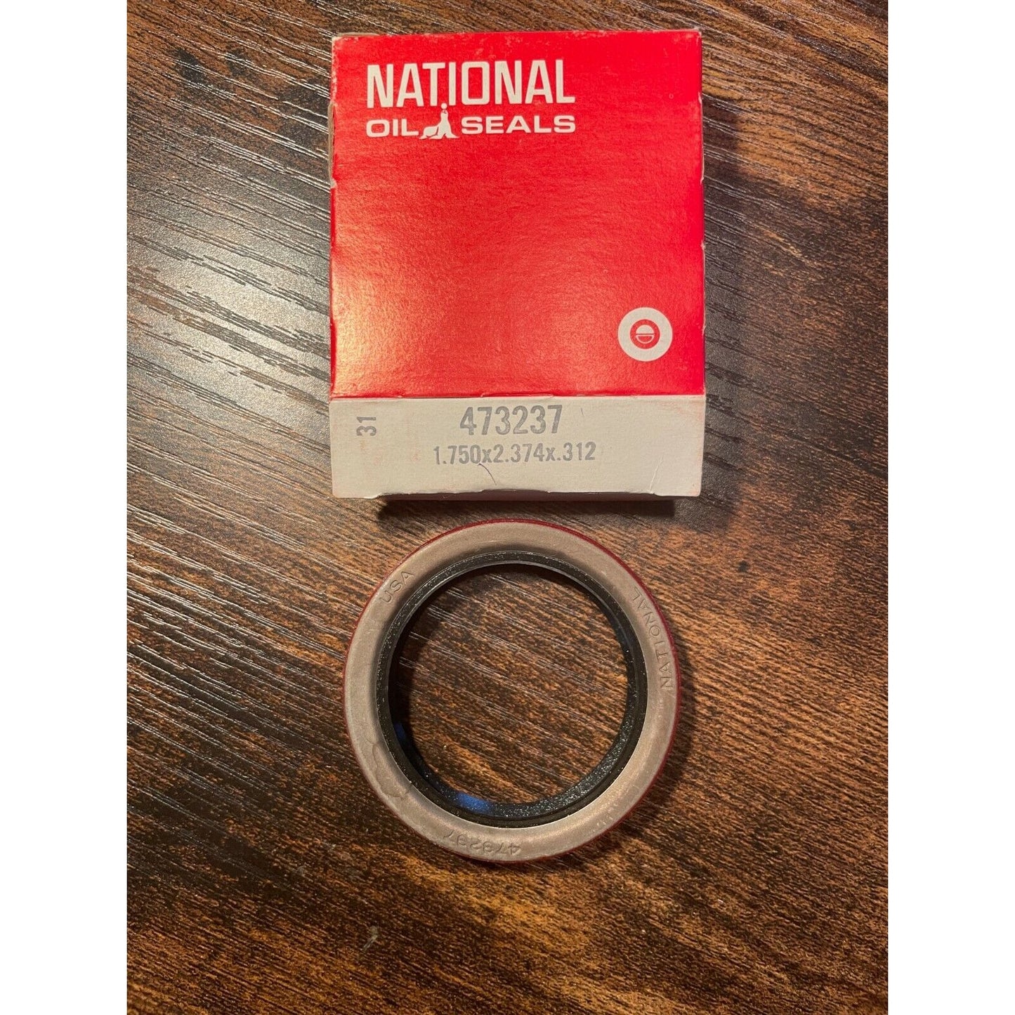 Wheel Seal National Oil Seals 473237, 1.750x2.374x0.312 item and box