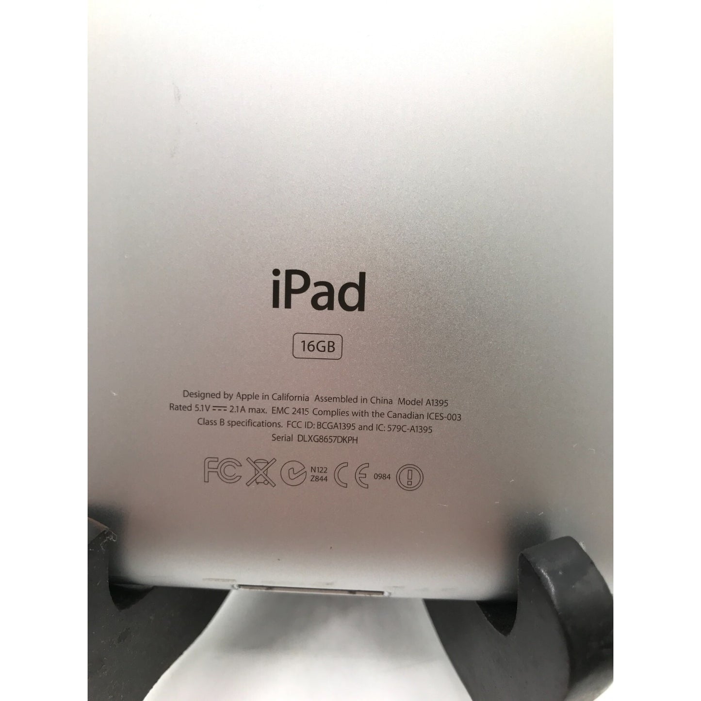 Used iPad 2 Model A1395 16GB with charging cable product stamp closeup