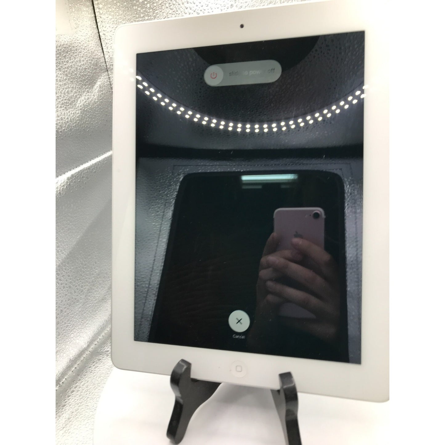 Used iPad 2 Model A1395 16GB with charging cable front view powered on