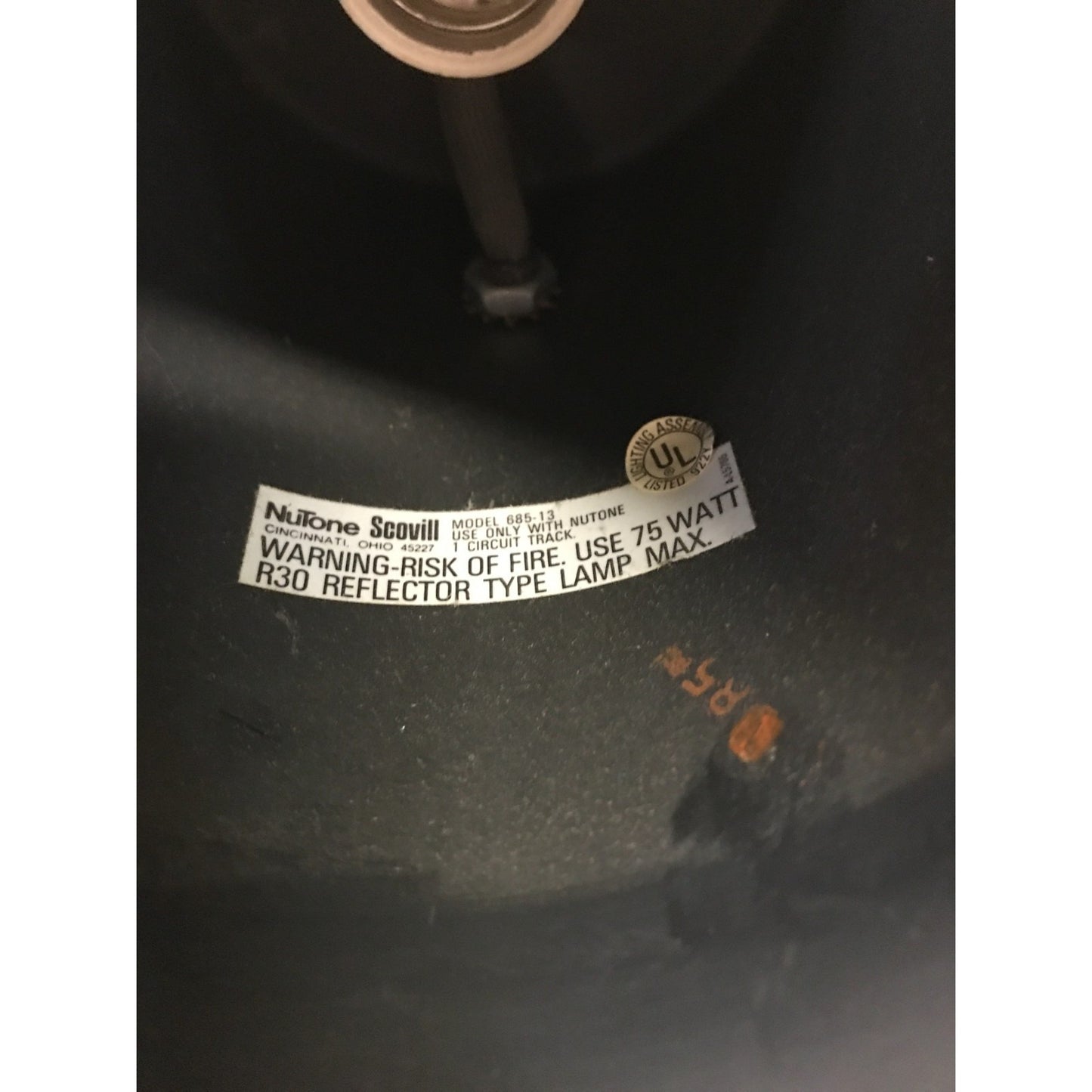 Pair of NuTone Scovill Model 685-13 Black Adjustable Can/Stage Lights closeup of NuTone product label