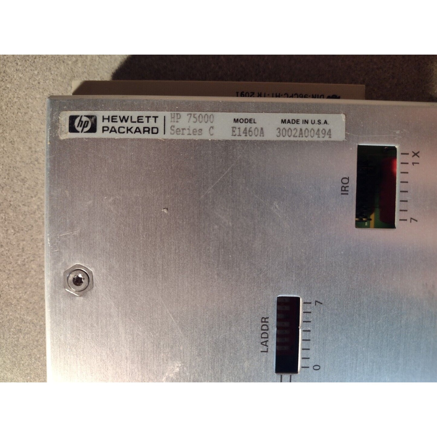 HP E1460-66201 64-Channel Relay Module product label closeup model, serial number