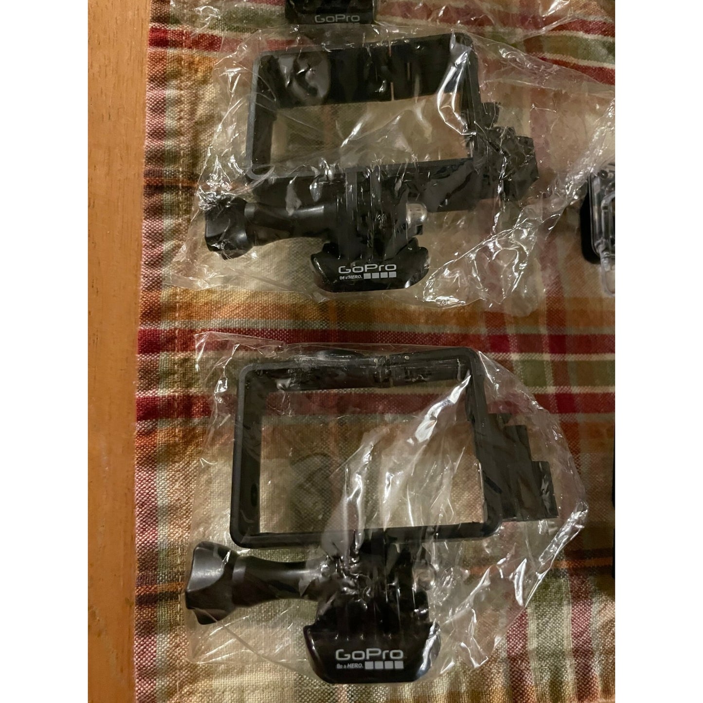 GoPro Hero 3, 3+, 4 Cases - Lot of 9, Various Cases closeup in packaging