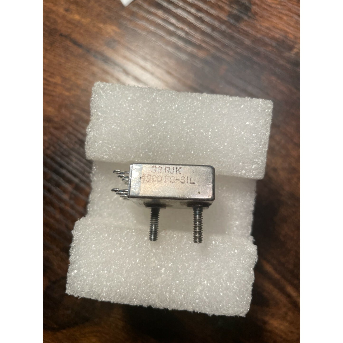 SIGMA Instruments Mil Spec Metal Relay, 33RJK 4900FG SIL, 4900 OHMS, 26VDC, 2Amp side view with product marking