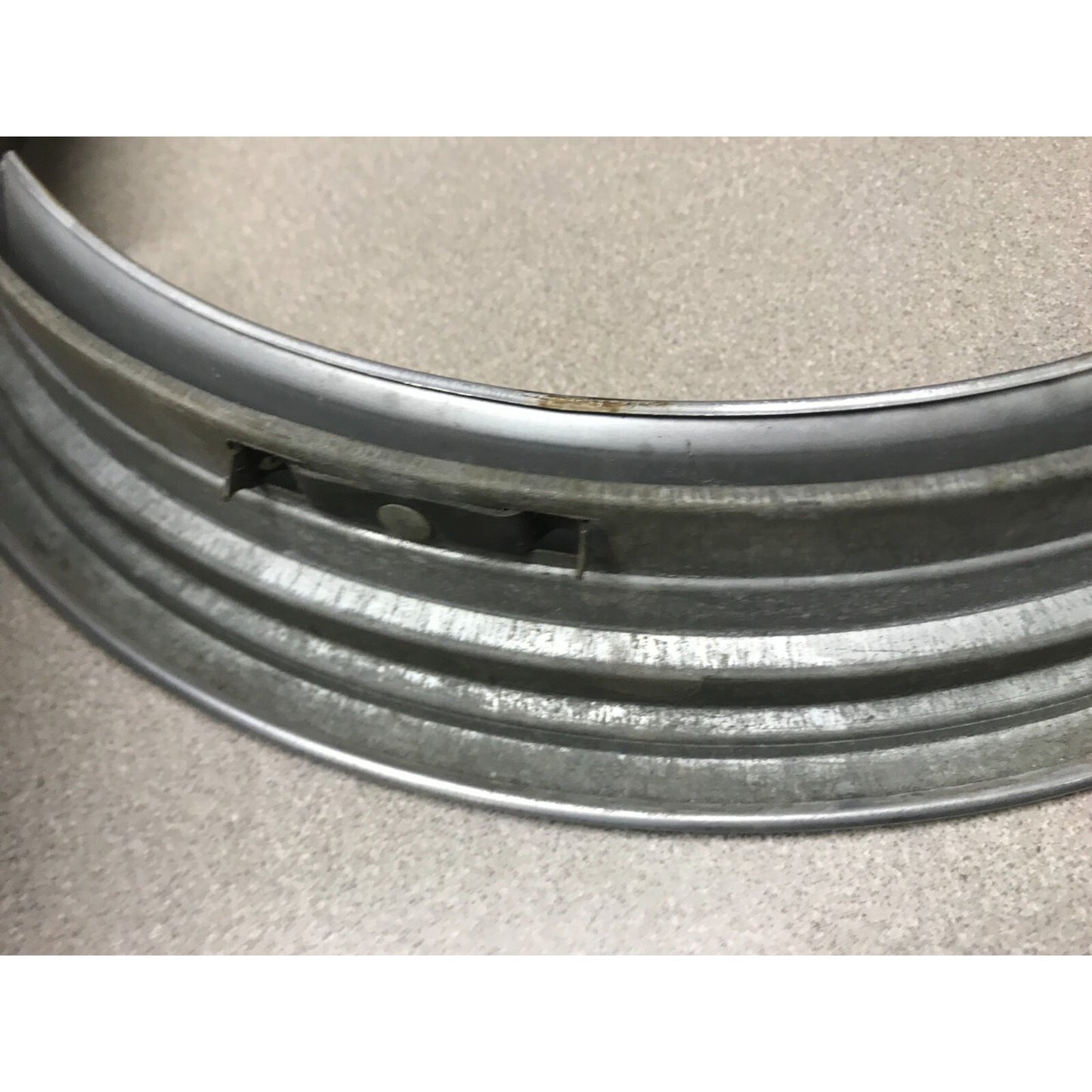 Lot 4 Unmatching 1966 Pontiac GTO OEM Wheel Trim Rings side of rim close up