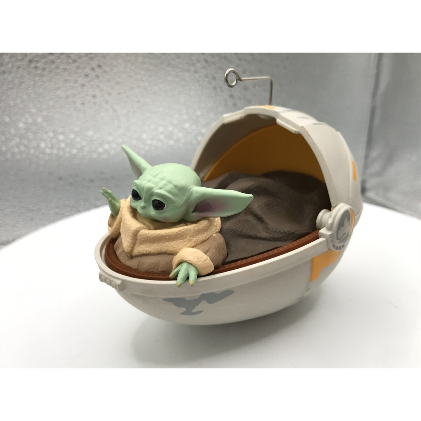 2020 The Child Hallmark Keepsake Christmas Tree Ornament from Star Wars The Mandalorian baby Yoda out of packaging front view