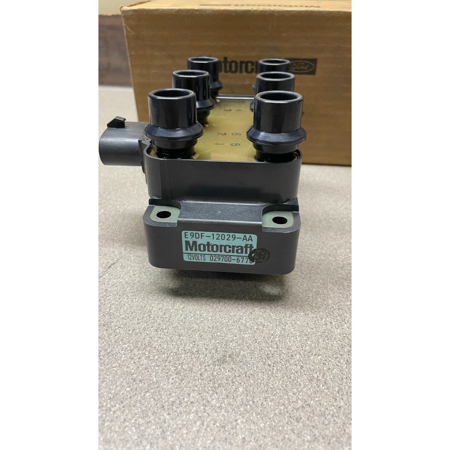 Motorcraft FORD 12 Volt Ignition Coil, part E9DF-12029-AA, 029700-6770 side view showing label with part number