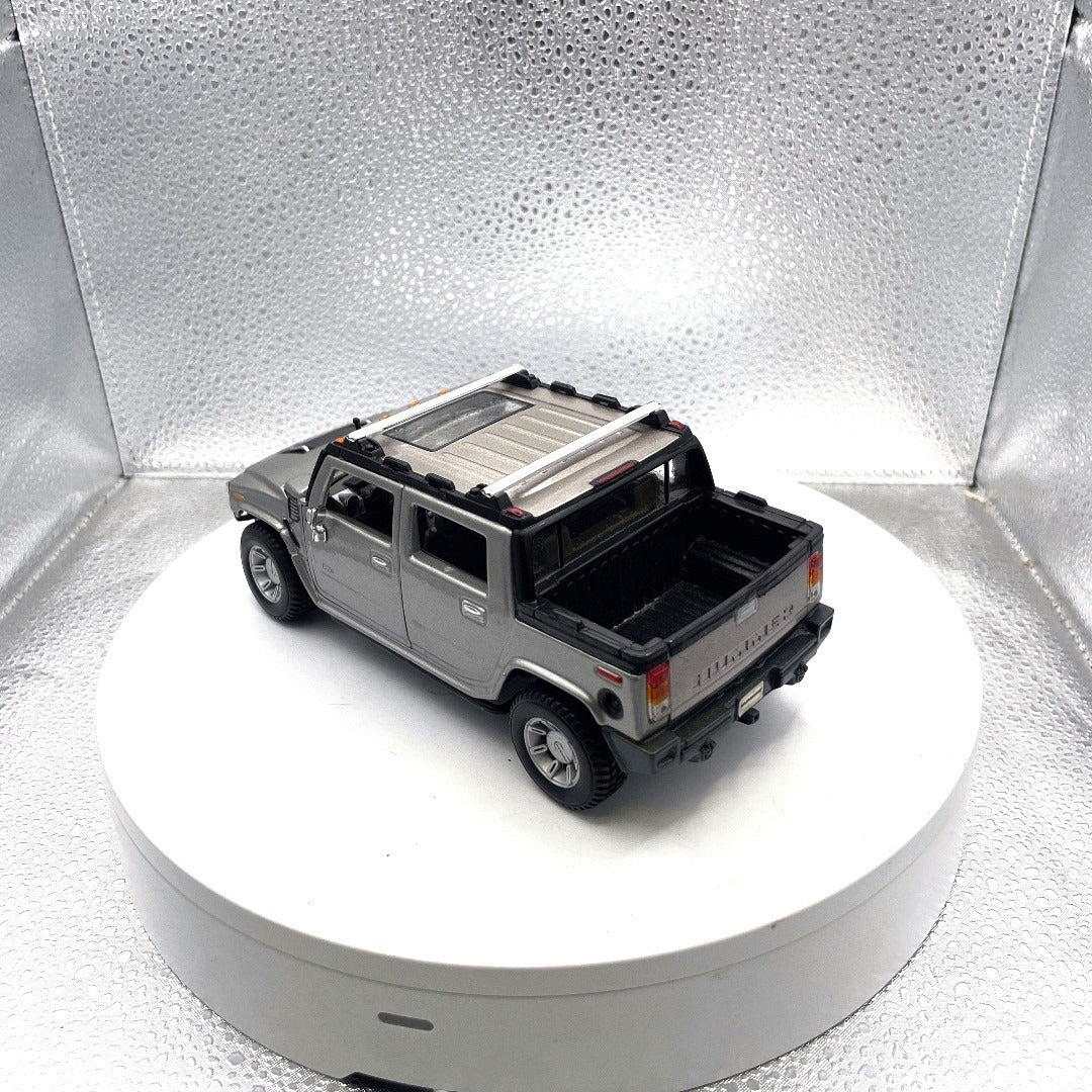 Maisto Hummer H2 Silver Die Cast, Scale: 1/27 drivers side/back end view
