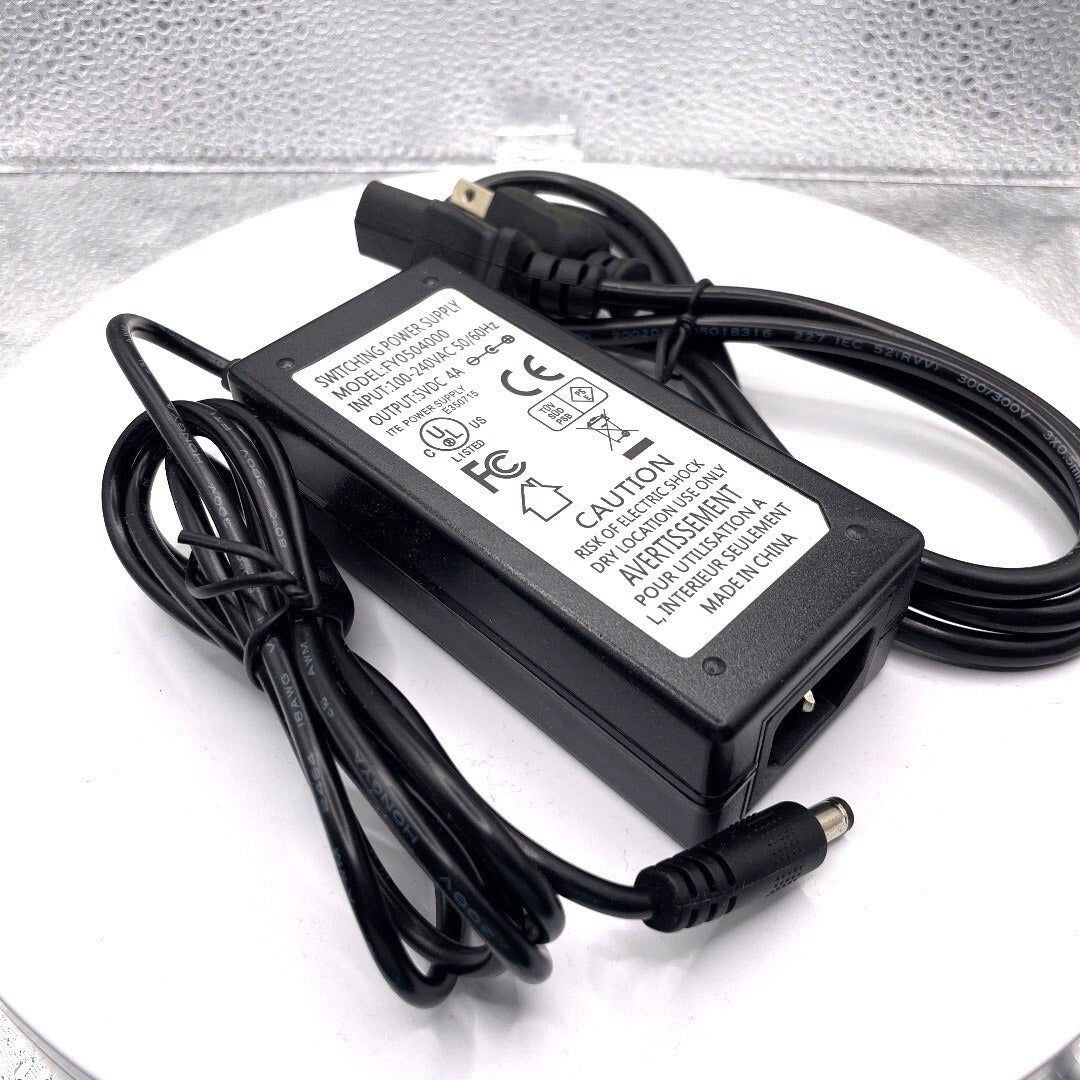 Switching Power Supply Model FY0504000 100-240Vac in, 5Vdc out side view with cables