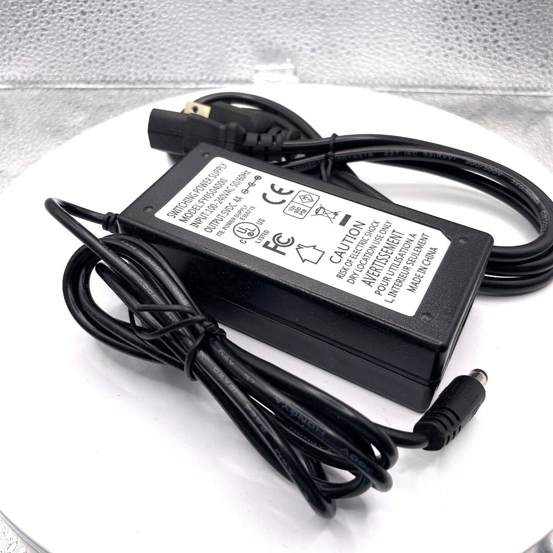 Switching Power Supply Model FY0504000 100-240Vac in, 5Vdc out side view with cables