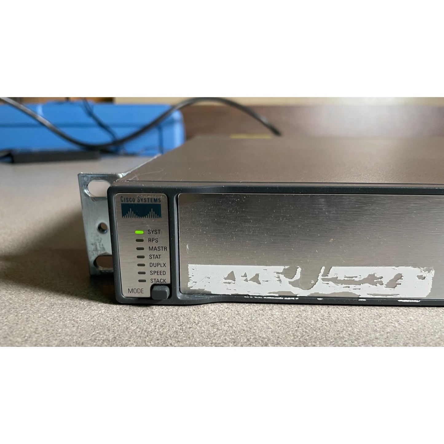 Cisco Systems Catalyst 3750 Series PoE-24 left side if front panel with status lights illuminated