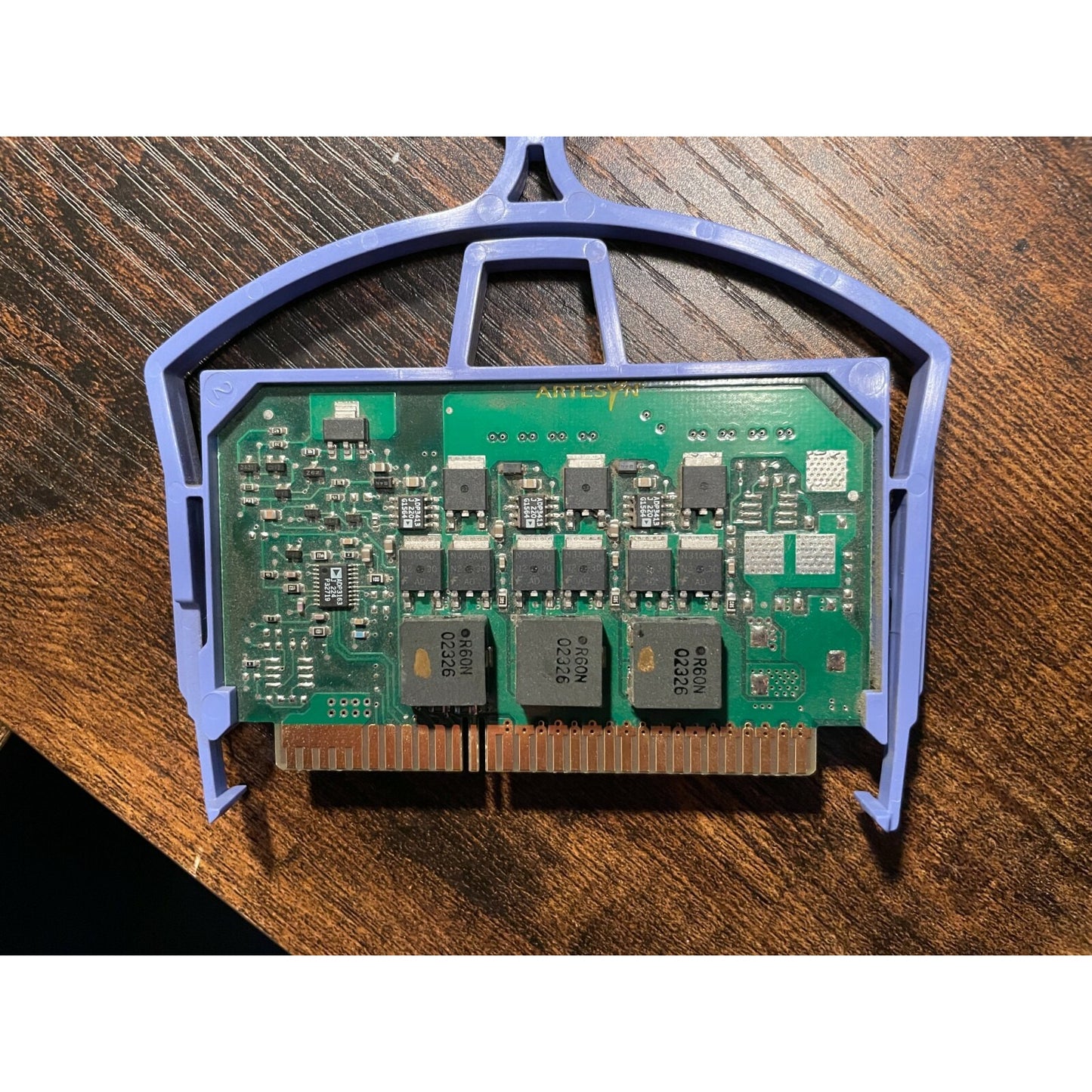 Artesyn Card 5100798-0400 - With plastic holder front view of circuit board