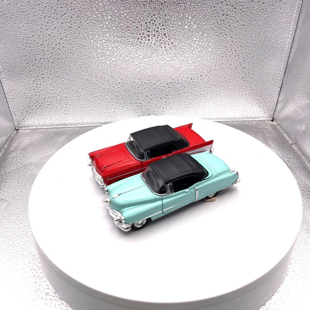 Welly Wind Up Car Lot of 2, 1857 Chevrolet Bel Air Red, 1953 Cadillac Eldorado Teal driver's side view