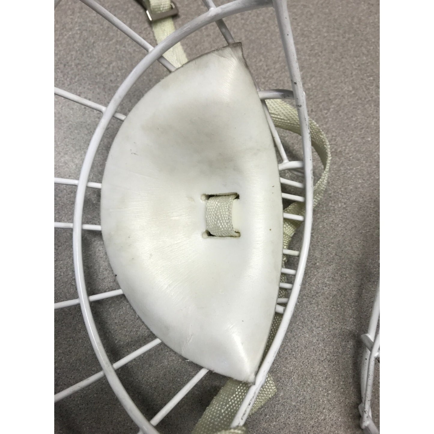 Two Hockey Cage Masks White Metal 7.5 inch (one with chin pad) inside chin pad view