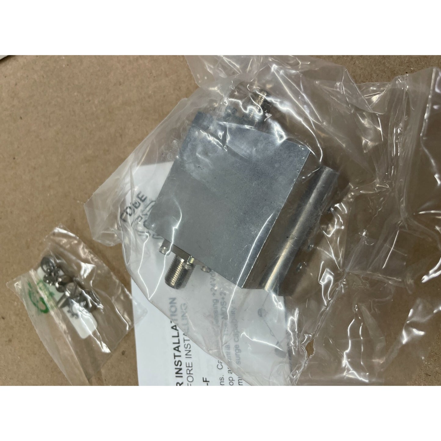 PolyPhaser Equipment +24VDC Pass 75 Ohms Coax Protector @50W back side in packaging