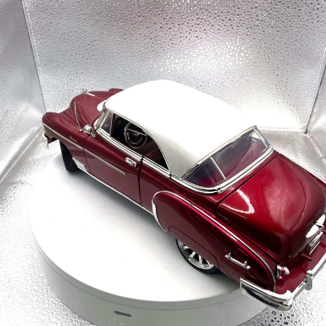 Motor Max 1955 Chevrolet Bel Air Burgundy Die Cast, Scale: 1/18, No. 73184 driver's side/rear view