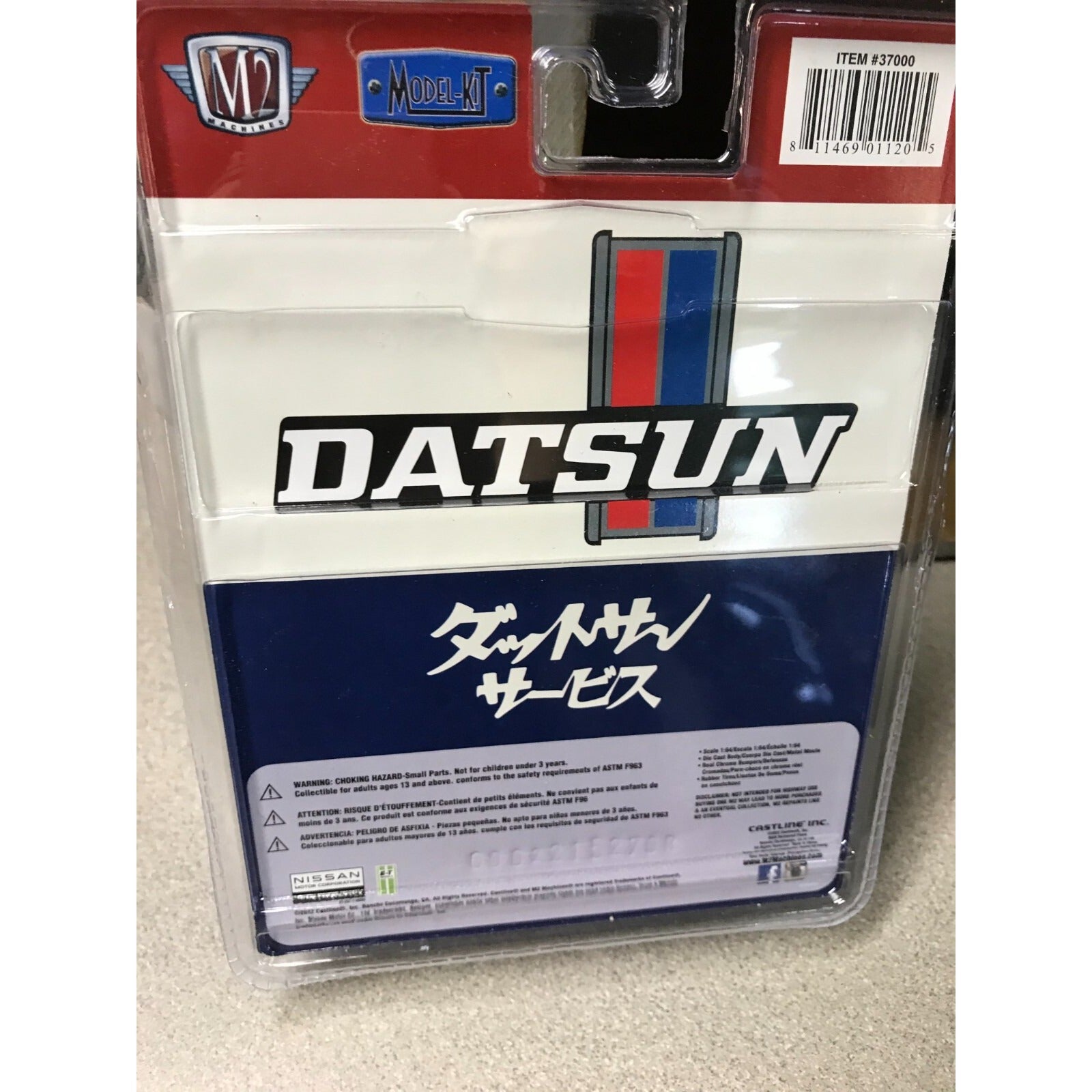 M2 Limited Edition 1976 Datsun Truck R51 with Lift & Accessories back of package