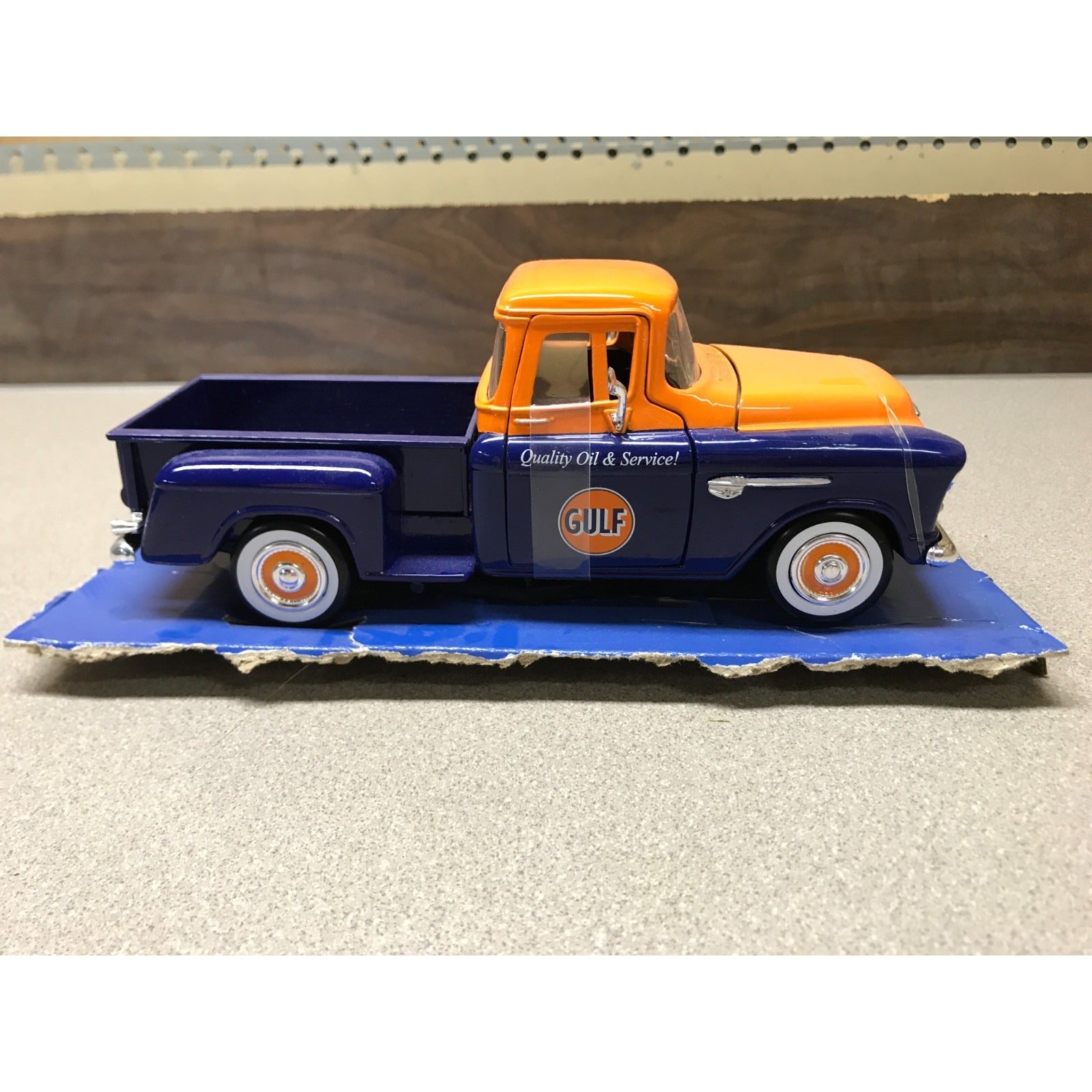 1955 Chevy 5100 Stepside Pickup Truck Gulf Dark Blue and Orange 1/24 Diecast Model Car by Motormax #79651  passenger side view