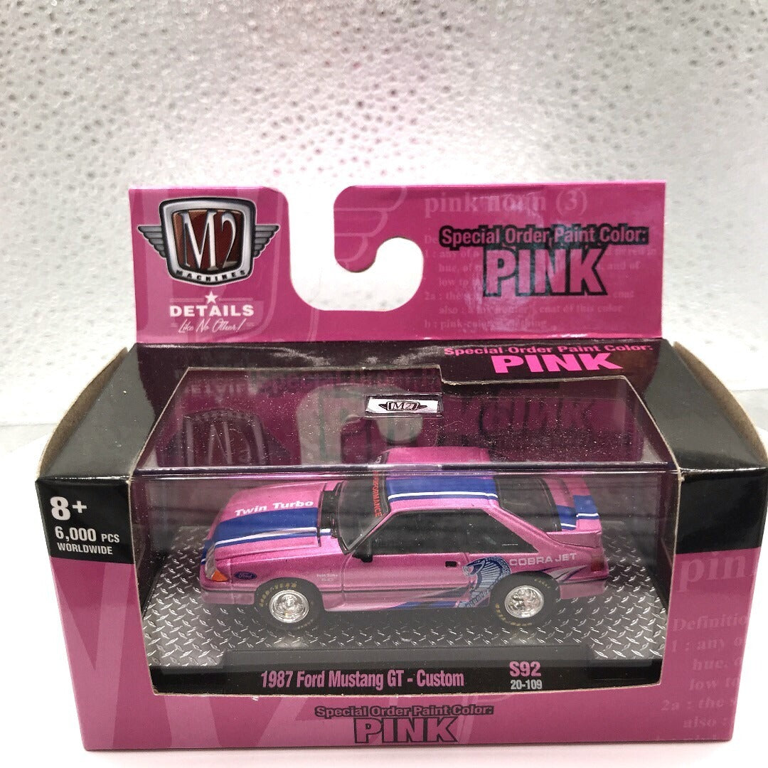 M2 Pink Cars Set of 3 - Includes 1985 Chevrolet Camaro IROC-Z, 1957 Chevrolet Bel Air Gasser, and 1987 Ford Mustang GT - Custom front view 