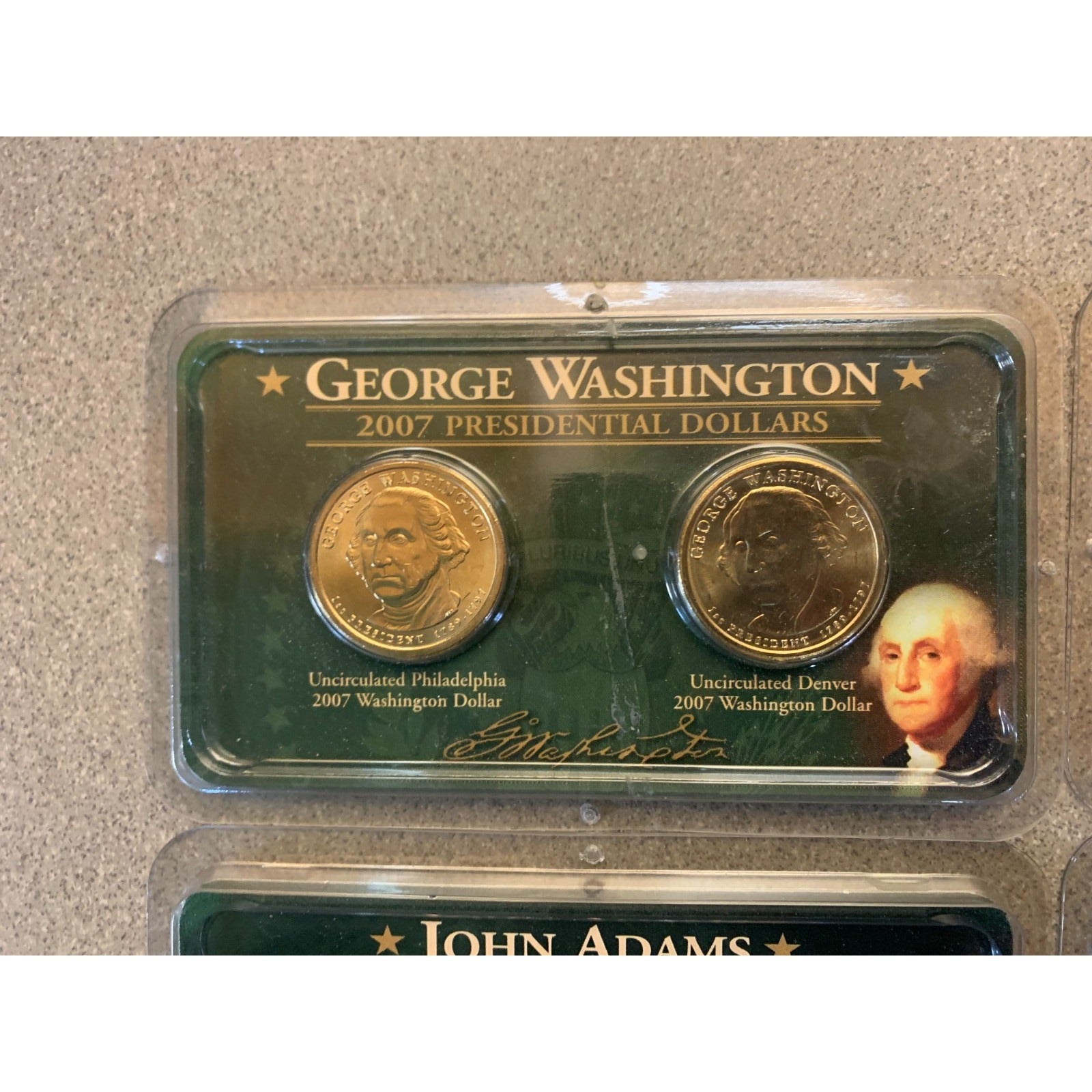 2007 Presidential $1 Coins - Includes Washington P+D 2 coin sets closeup of front of set
